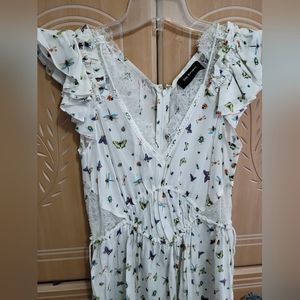 The Kooples White butterflies dress.  Size XXS